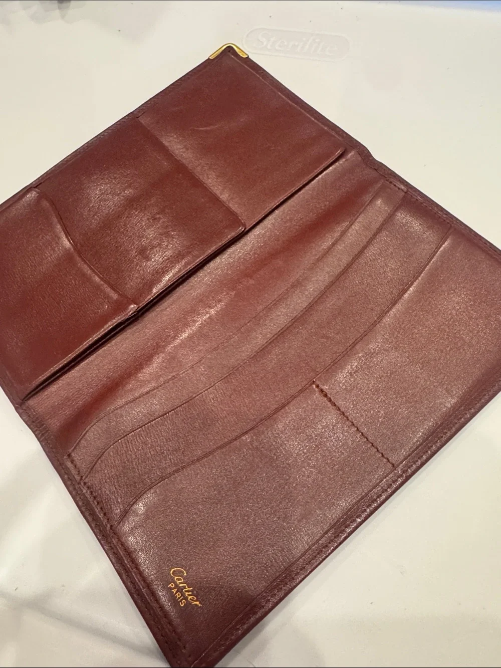 Cartier Burgundy Leather Long Wallet with Gold Corner Accents